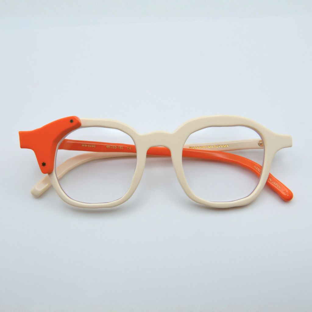 Masahiro Maruyama cream frames with orange temples